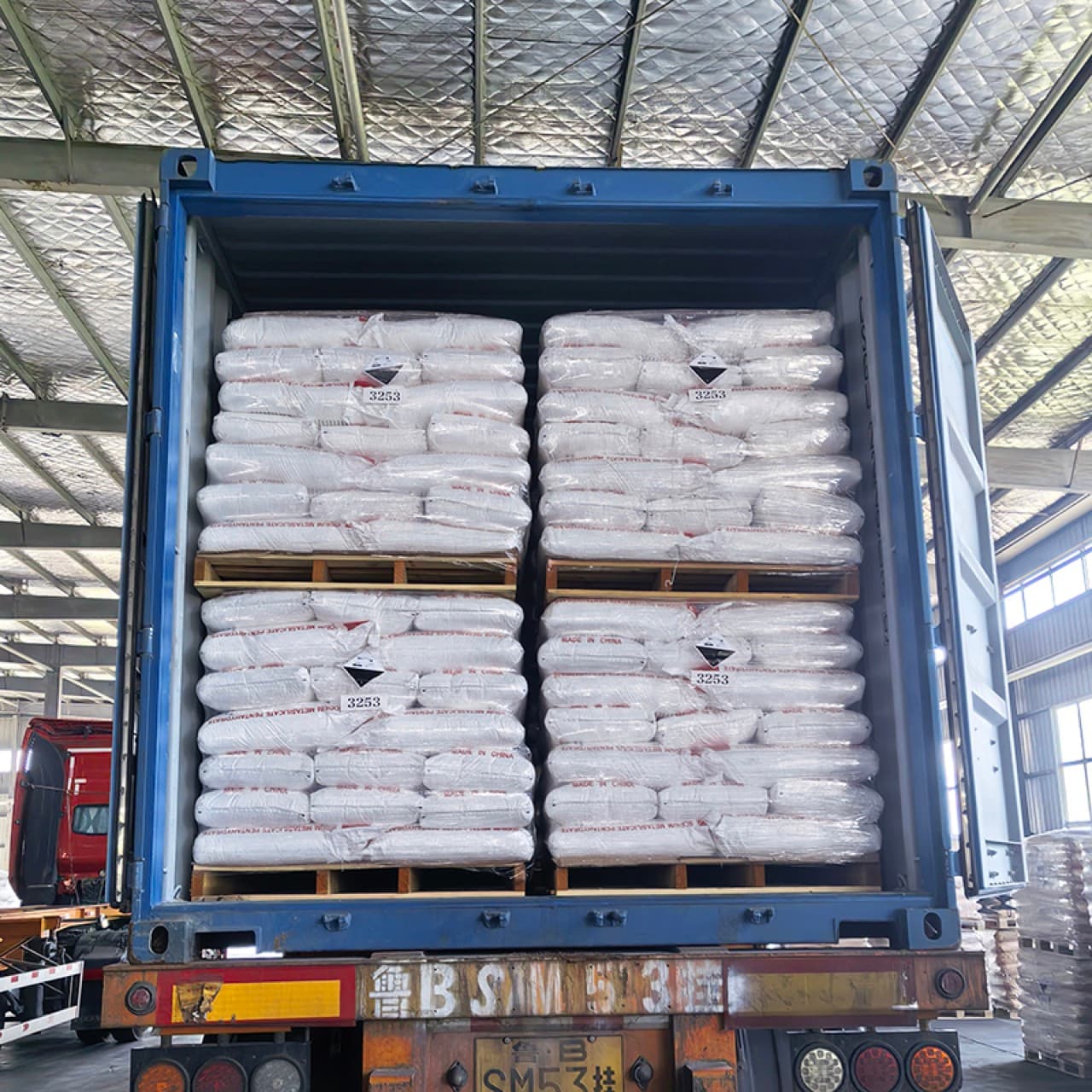 Palletised sodium metasilicate bags loaded into an export shipping container