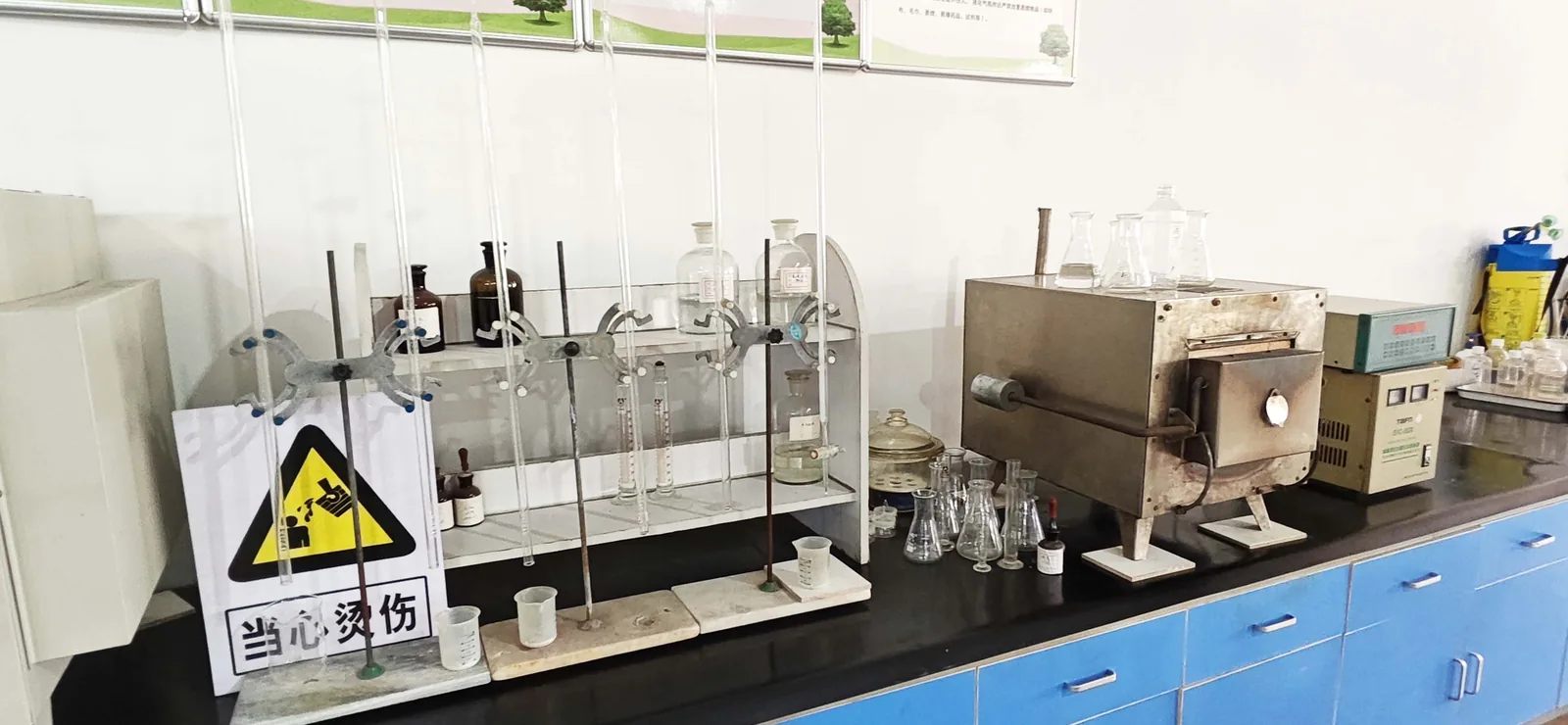 Titration glassware bench with a muffle furnace and temperature controller in the laboratory