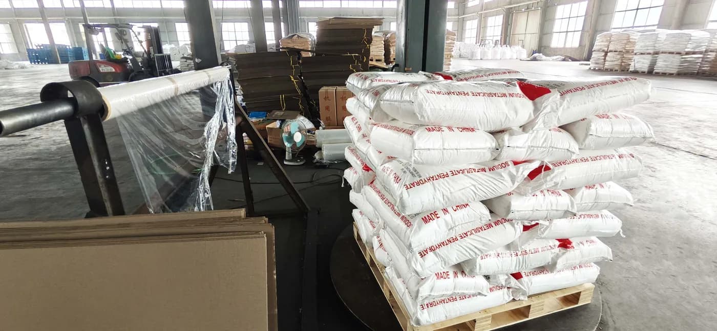 Forklift and palletized sodium metasilicate pentahydrate bags in the packing and staging area