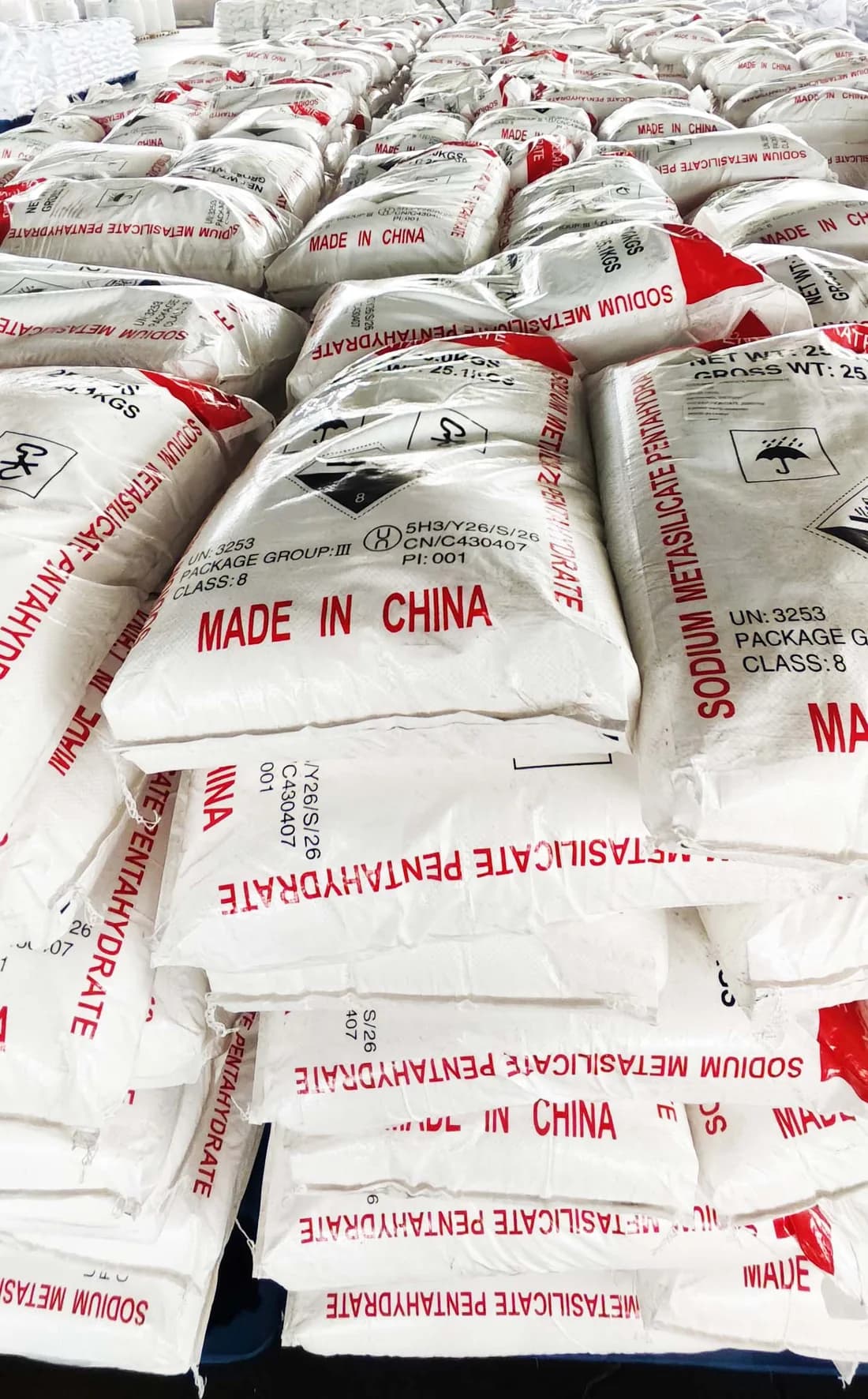 Close-up of export bags printed Sodium Metasilicate Pentahydrate, UN 3253, Class 8, Made in China
