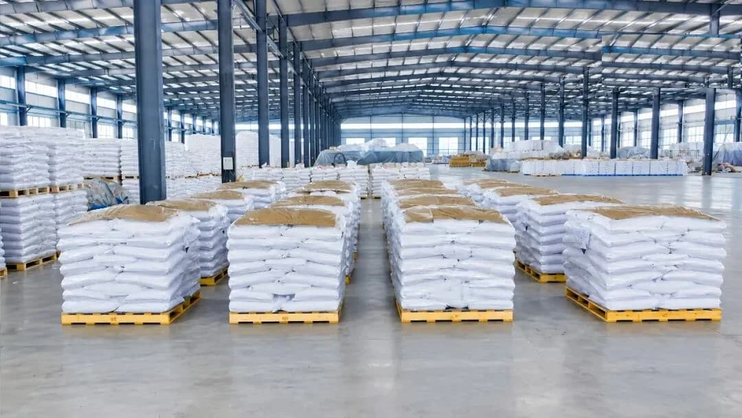 Branded warehouse filled with palletized bags of finished sodium metasilicate